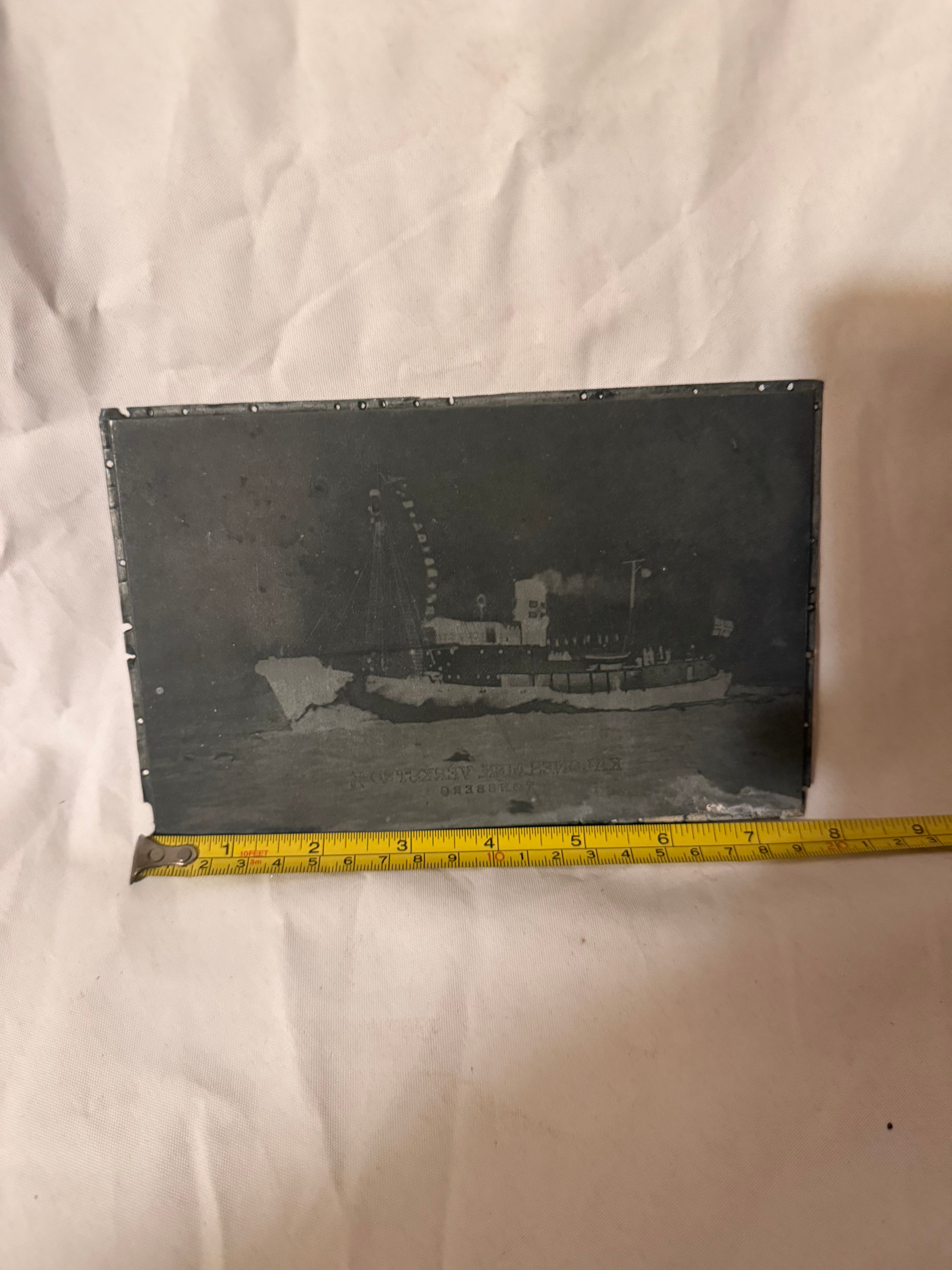 Gammel stempelplate av hvalbåt